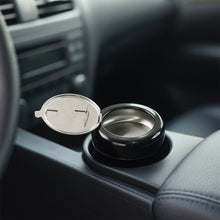 Close up of smokeless round ashtray capturing smoke efficiently