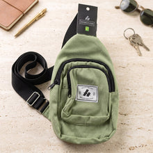 Durable canvas crossbody bag with zip pockets for everyday use