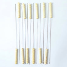 Grilling skewers set with wooden handles for kebabs and vegetables