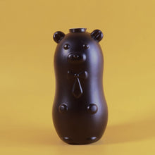 Bear shaped toilet tank cleaner close up view showing automatic cleaning features