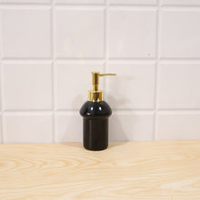 Decorative black glass soap dispenser for modern bathrooms