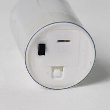 The bottom of an LED flameless candle showing the battery compartment, an on/off switch, and 'MADE IN CHINA' text.