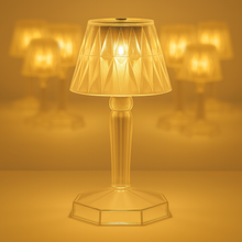 The crystal table lamp showcasing its unique reflection light effect in a dark room.
