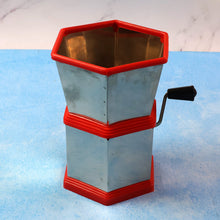 Hand-operated vegetable cutter with sharp stainless steel blades