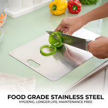 Hands slicing green bell pepper on a stainless steel cutting board on a light green countertop with text overlay.