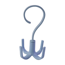 A light blue plastic rotating multi-hook hanger is shown against a plain white background.