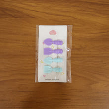 Playful hair styling using decorative spoon and spatula hair clips