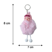 Size comparison of plush doll keychain with soft fur ball charm