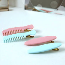 Display of elegant pastel comb-style hair clips for everyday wear