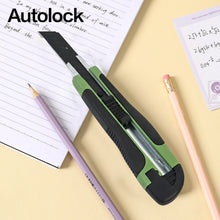 A green and black utility knife with the word 