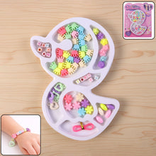 DIY jewellery making kit with colorful beads and elastic thread in organizer tray