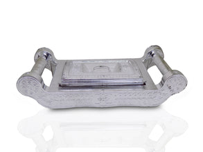 Elegant silver storage box with four sections for gifts and dry fruits.