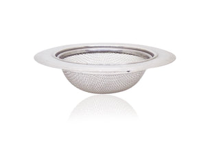 Stainless steel sink strainer effectively catching food particles in a kitchen wash basin drain.