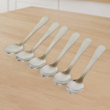 Close-up view of stainless steel dining spoons highlighting their sleek design