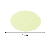 A light yellow oval pad on a white background, with a black double-headed arrow and '5 cm' indicating its length.