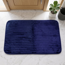 Soft absorbent carpet mat for shower and washbasin areas