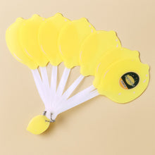 Foldable lemon-shaped hand fan closed in compact portable form