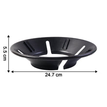 Flame protector ring securely placed on gas stove burner protecting cookware