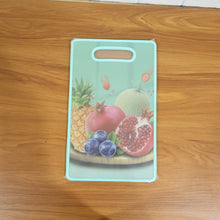Green cutting board in kitchen setting