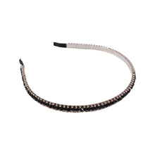 Decorative black metal headband with sparkling crystals