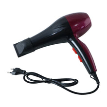 A red and black hair dryer with a concentrator nozzle and power cord is displayed on a plain white background.