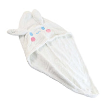 Hooded hair drying cap secured with button loop for easy use