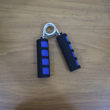 Person using foam grip hand exerciser to strengthen fingers