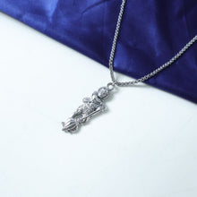 Overhead view of the Hanuman Ji pendant, emphasizing the detailed Gada.