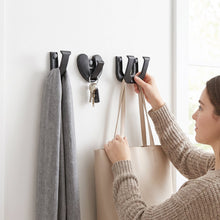 Heavy duty self adhesive hooks for hanging clothes and bags