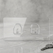 Close-up of adhesive backing on transparent wall hook