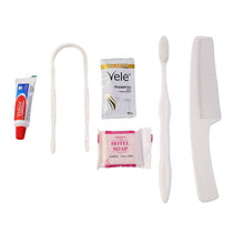Personal care kit items including comb and toothpaste