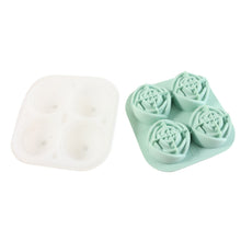 Rose shape ice cube tray filled with water and covered with lid