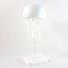 Colourful LED jellyfish lamp creating ambient lighting for home