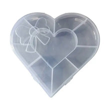 Top view of heart-shaped craft bead storage box with transparent lid in India