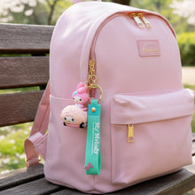 Detailed view of cute cartoon silicone keychain character with strap