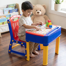 Compact children's study table with chair and activity board