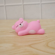 Rechargeable silicone sleeping bear lamp for children's room comfort.