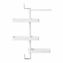 Rotating storage rack filled with kitchen items demonstrating storage capacity
