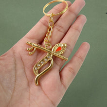 Front view of metal Krishna keychain with intricate peacock feather and flute