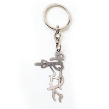 Compact devotional Krishna flute metal keychain in stainless steel