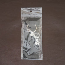 Krishna Flute Keychain displayed in a lifestyle setting, perfect for daily use.