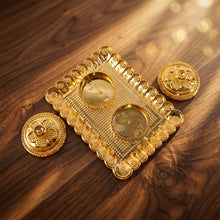 Golden floral kumkum holder detail