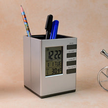 Multifunction digital desk clock showing time, date, and indoor temperature