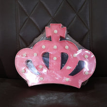 Crown LED night light displayed on a shelf as decorative lighting