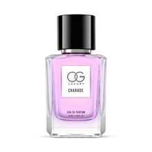 Hand holding Charade Eau De Parfum bottle showcasing premium design