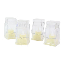 Four clear plastic lanterns with LED candles, arranged in a row on a plain white background.