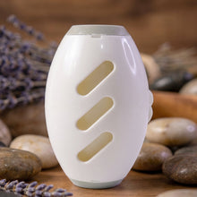 Hand holding reusable lint roller for easy cleaning