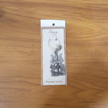 Lifestyle image showing Mahakal metal keychain as key accessory