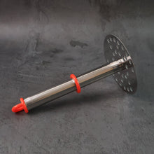 Potato masher held comfortably demonstrating ergonomic handle design