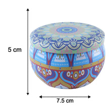 Ornate round tin container for keepsakes and decor